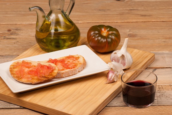 Bread slices with tomato and olive oil, a Mediterranean appetizer